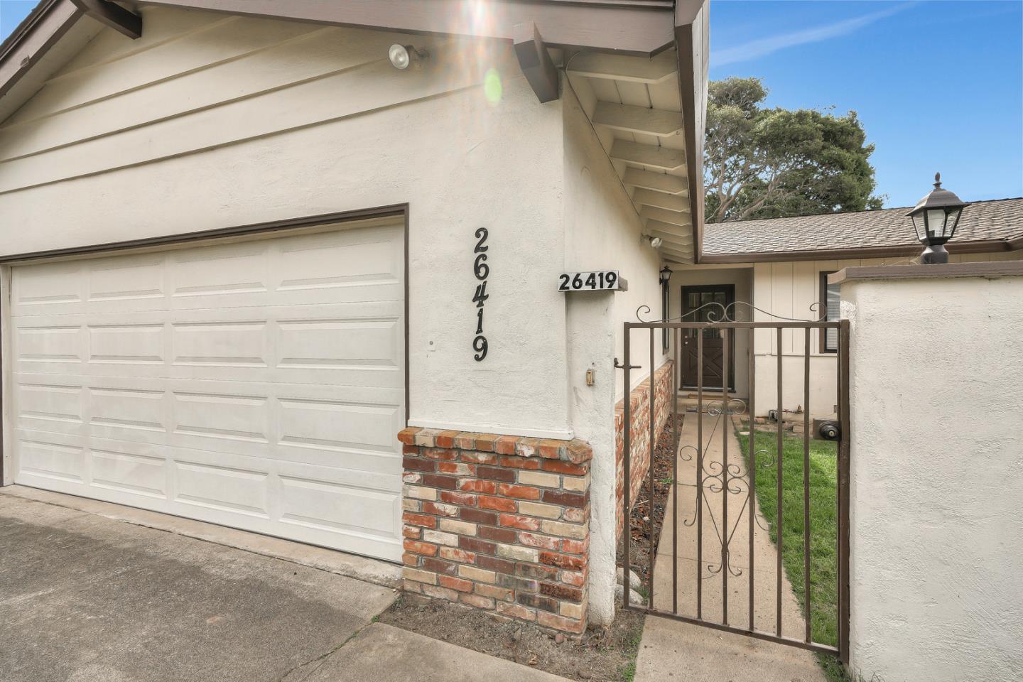 26419 Oliver Road Carmel, CA 93923 - Photo 3 of 35 a view of a house with a door and wooden walls