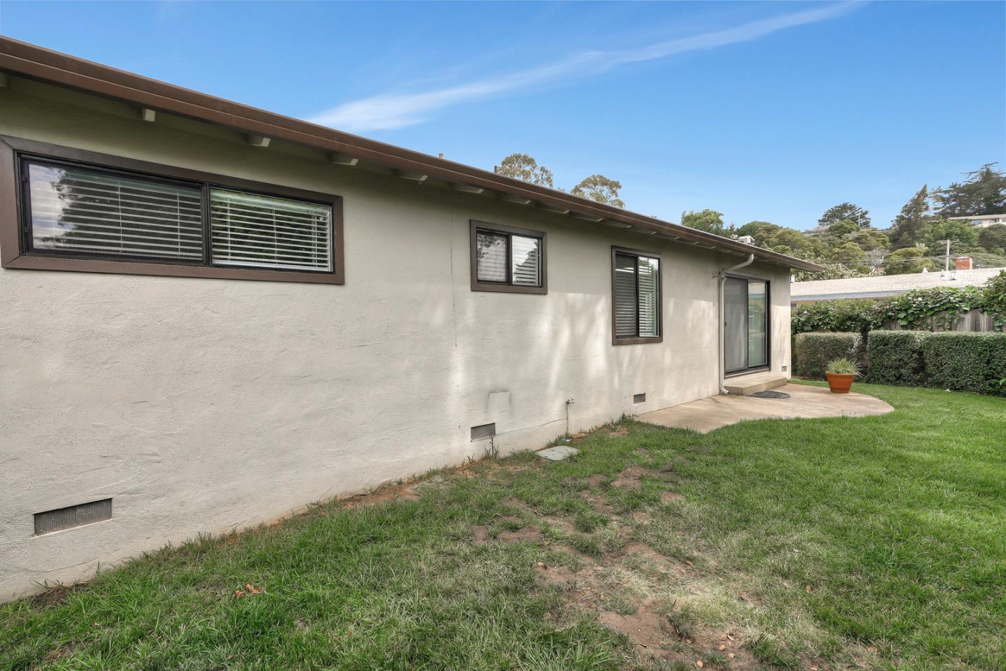 26419 Oliver Road Carmel, CA 93923 - Photo 33 of 35 a front view of a house with a yard