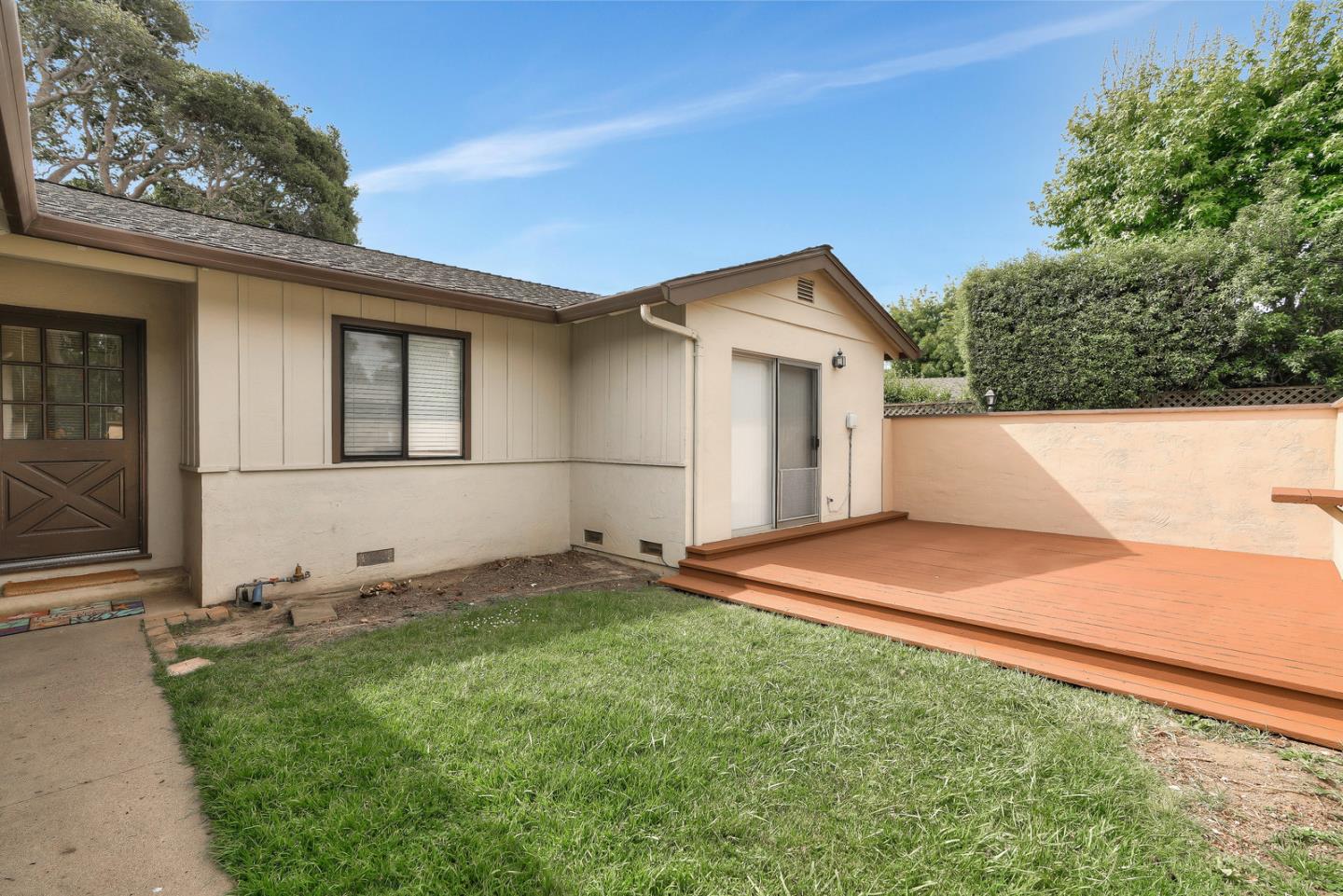 26419 Oliver Road Carmel, CA 93923 - Photo 5 of 35 a house view with a backyard space