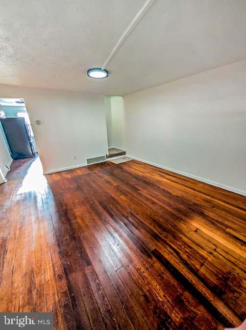 414 Avondale Road Dundalk, MD 21222 - Photo 2 of 17 a view of empty room with wooden floor