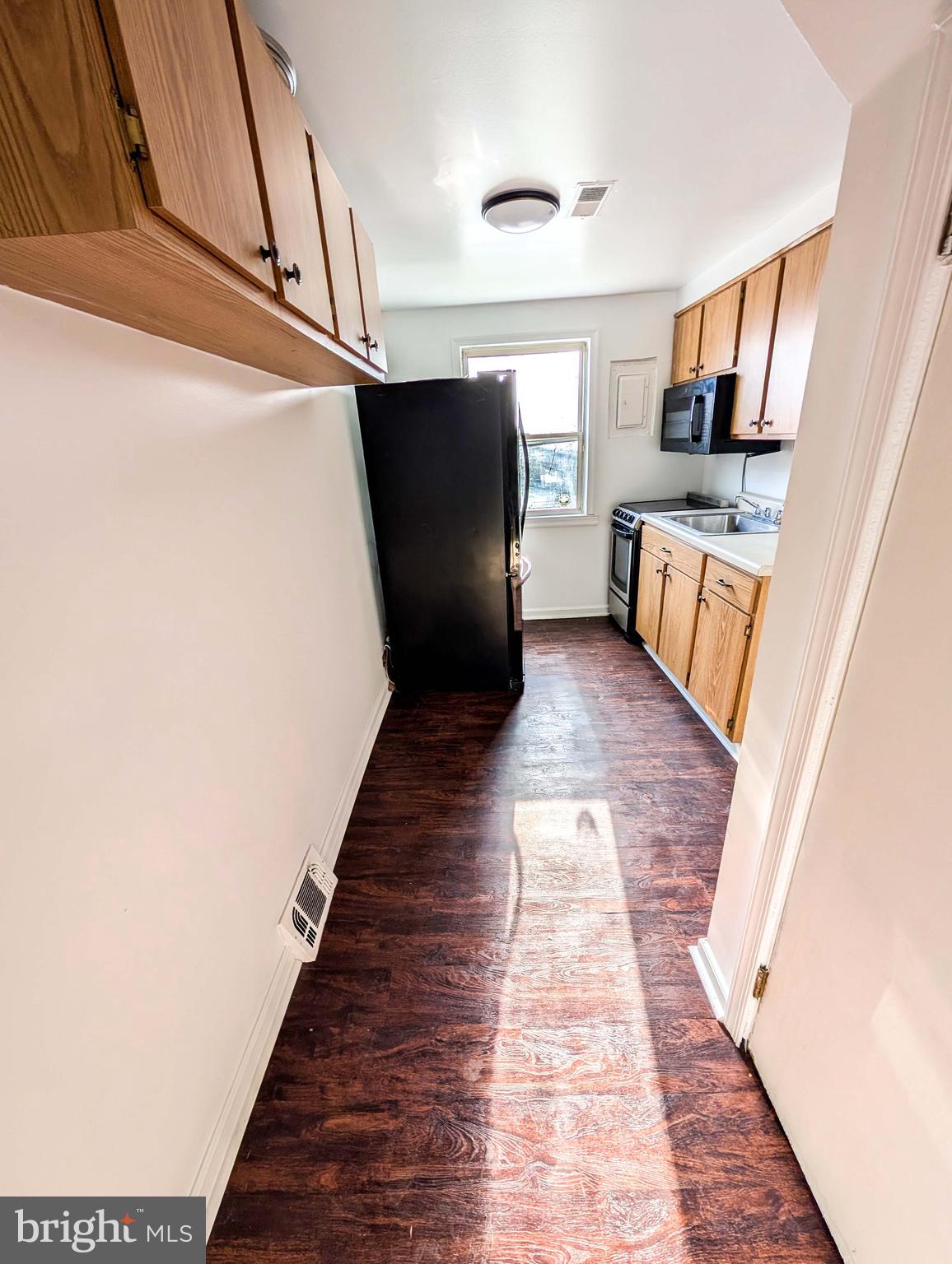 414 Avondale Road Dundalk, MD 21222 - Photo 6 of 17 a view of entryway with wooden floor