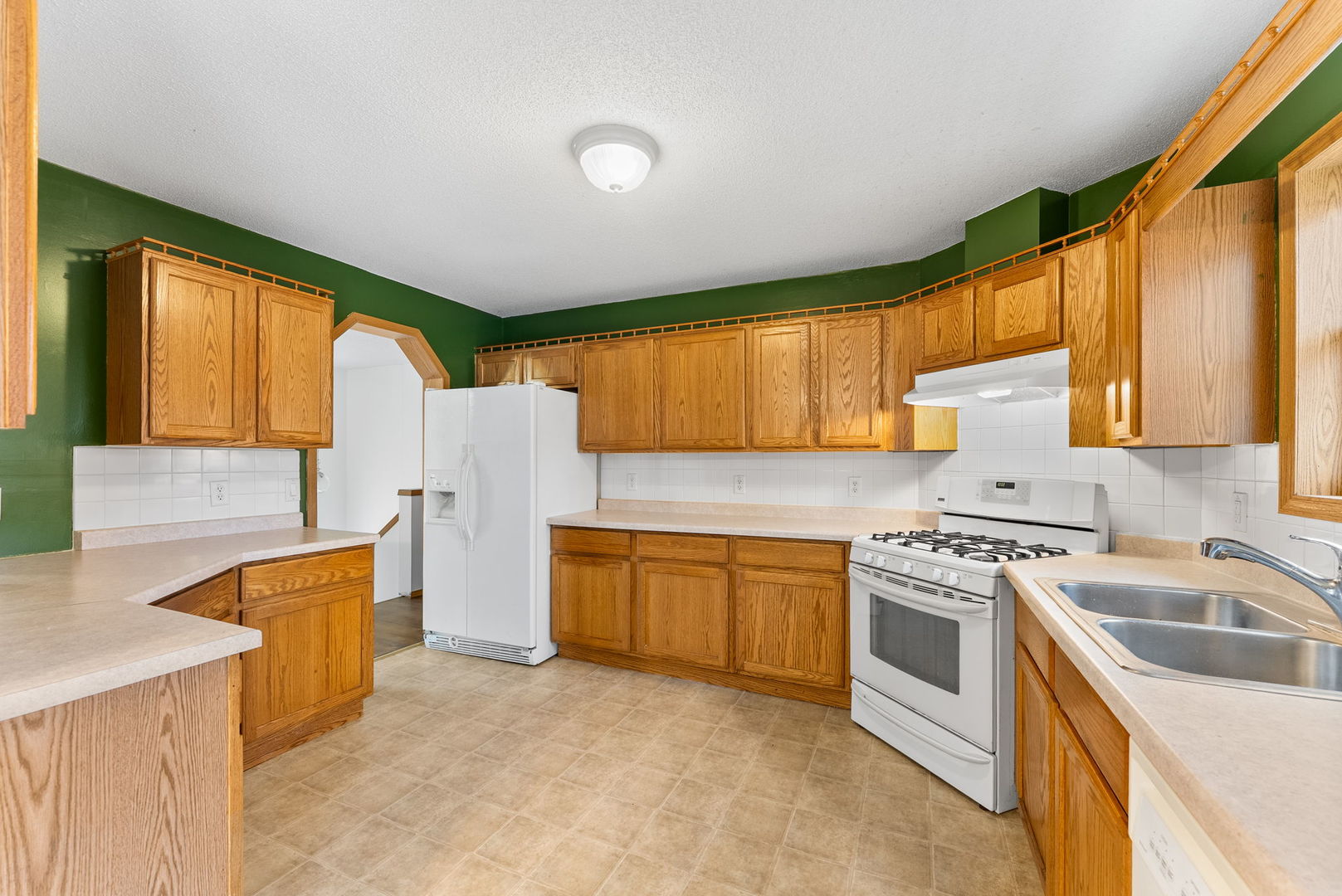 449 83rd Avenue New Boston, IL 61272 - Photo 10 of 25 a kitchen that has a sink and a stove top oven