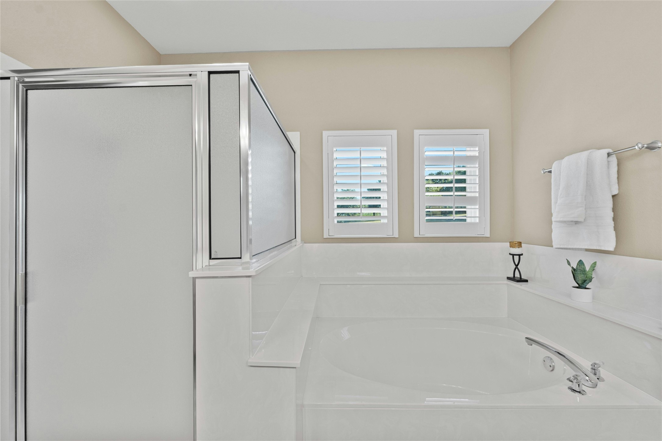 209 Overlook Court Georgetown, TX 78628 - Photo 22 of 34 a bathroom with a bathtub and a shower