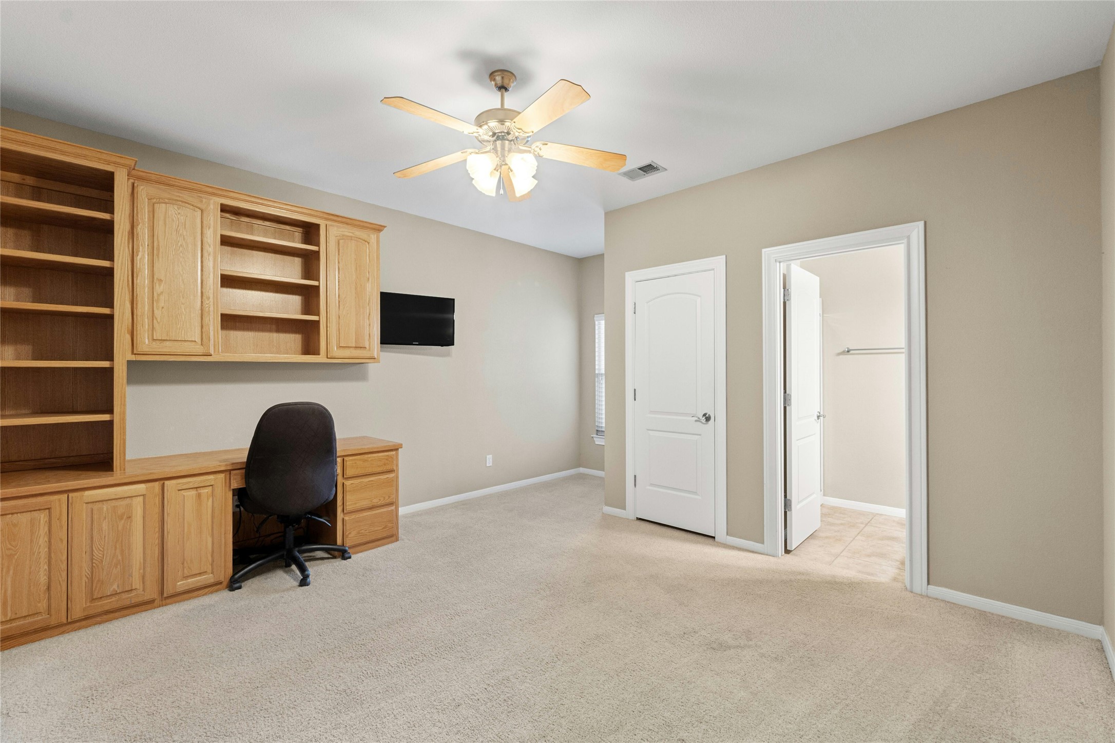 209 Overlook Court Georgetown, TX 78628 - Photo 24 of 34 a view of a workspace with furniture and a window