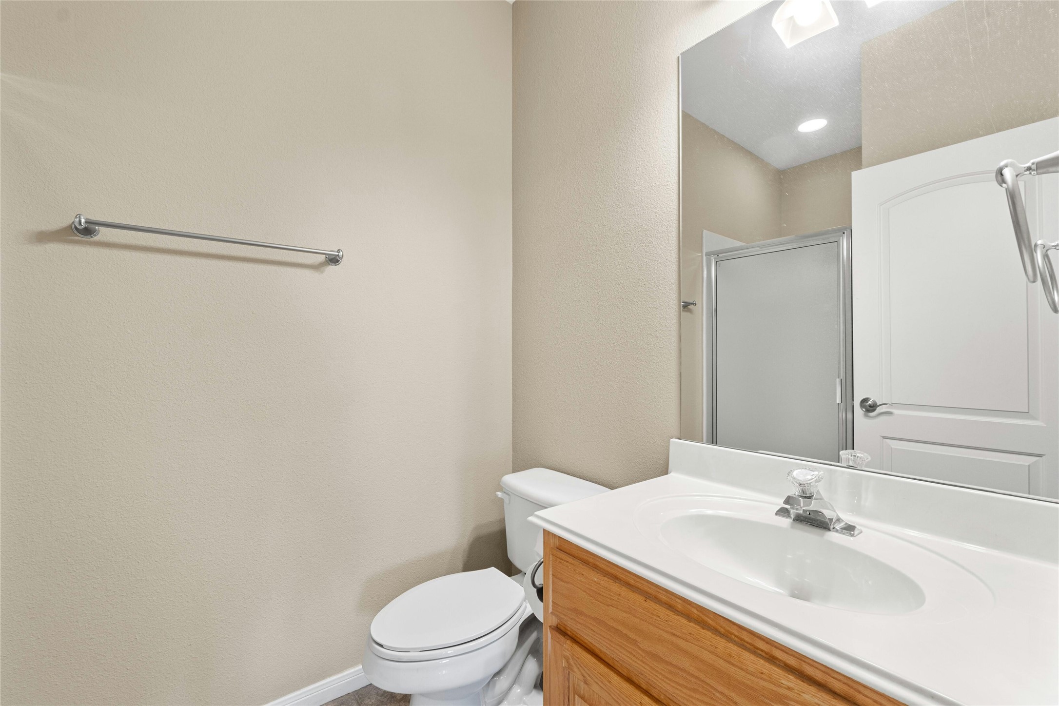 209 Overlook Court Georgetown, TX 78628 - Photo 25 of 34 a bathroom with a sink toilet and vanity