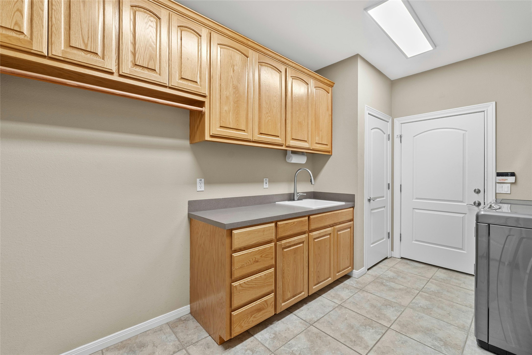 209 Overlook Court Georgetown, TX 78628 - Photo 29 of 34 a kitchen with stainless steel appliances granite countertop a refrigerator and cabinets