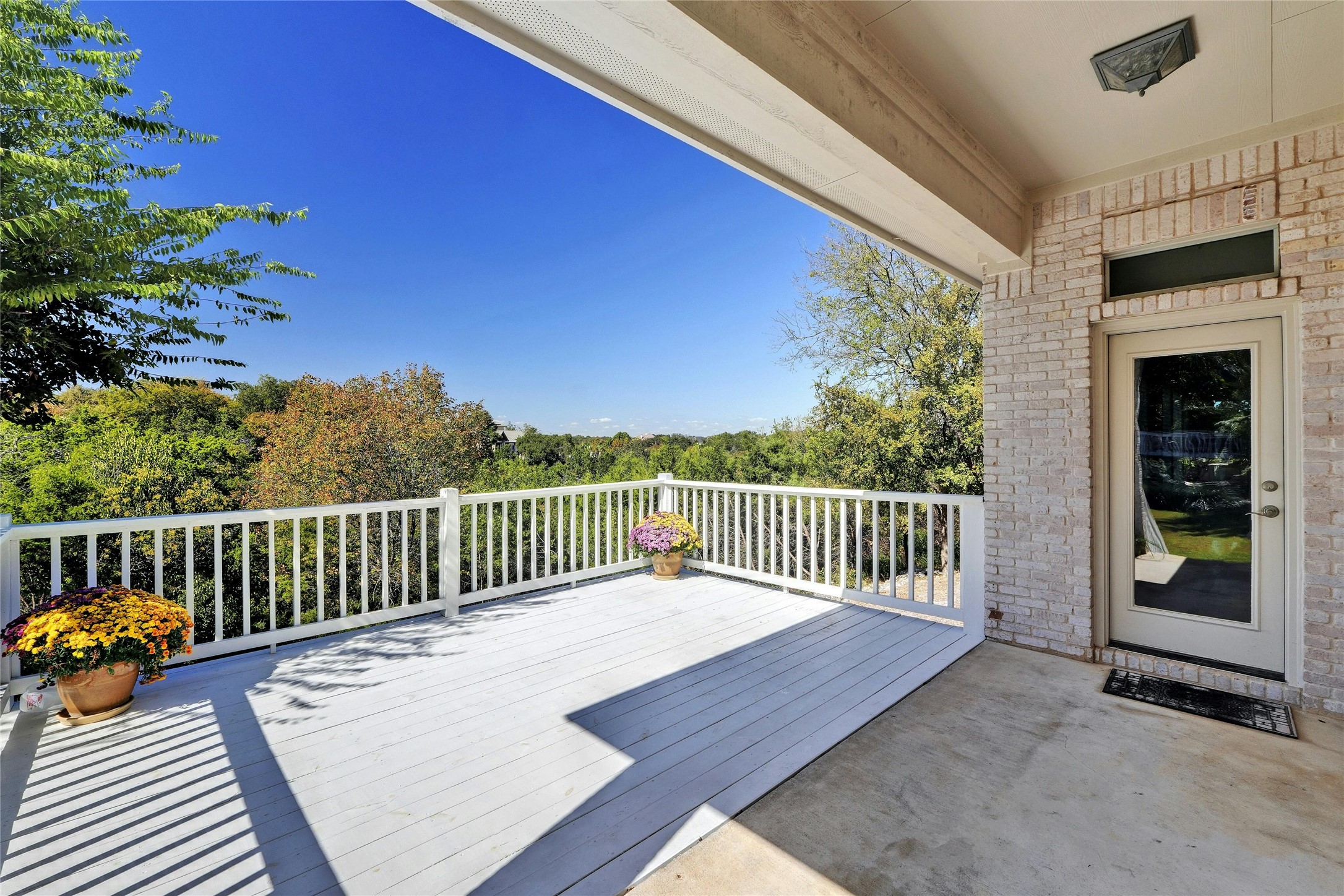 209 Overlook Court Georgetown, TX 78628 - Photo 32 of 34 a view of a wooden deck with a bench
