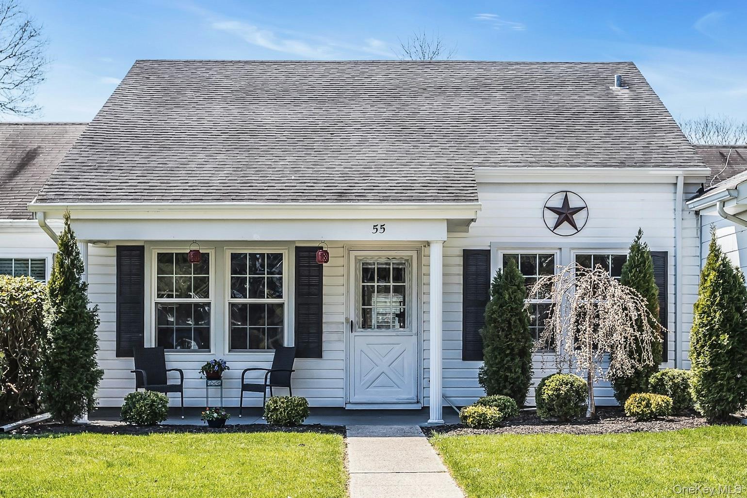 55 Forge Lane Coram, NY 11784 - Photo 1 of 28 a front view of a house with garden