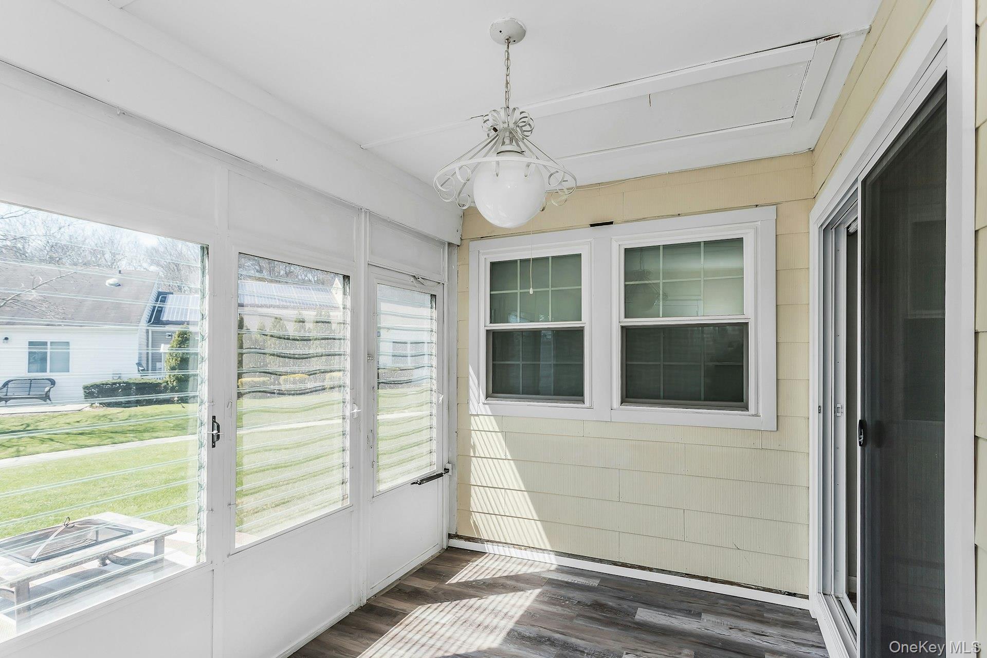 55 Forge Lane Coram, NY 11784 - Photo 11 of 28 a view of a bedroom with a large window and bed