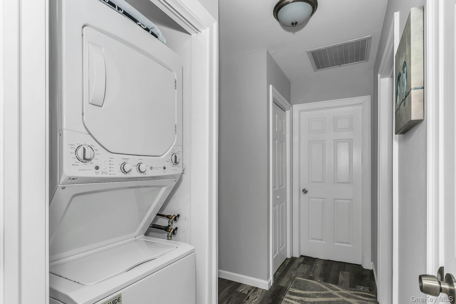 55 Forge Lane Coram, NY 11784 - Photo 16 of 28 a utility room with dryer and washer