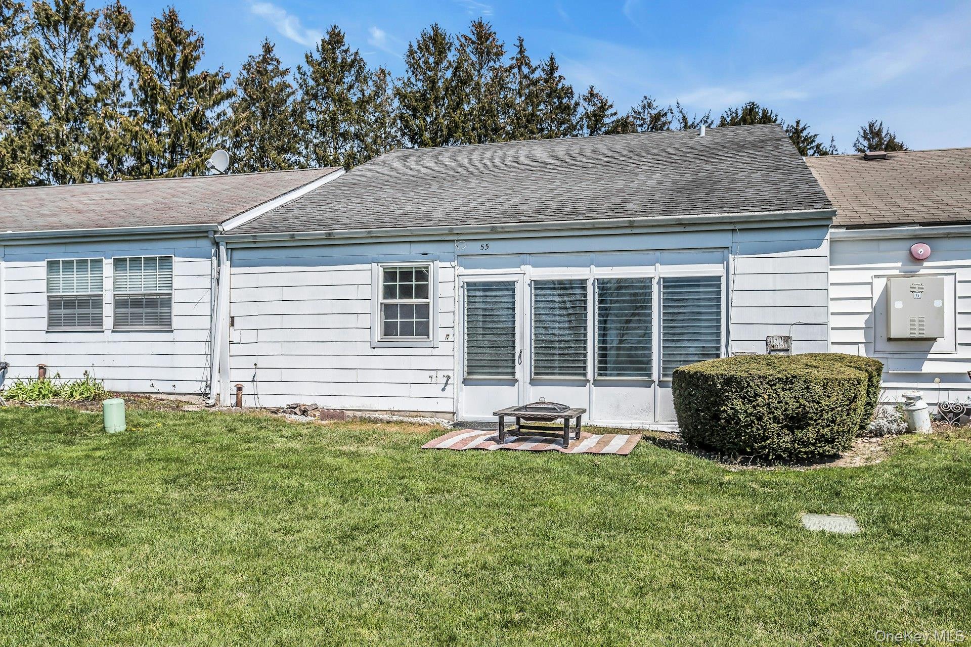 55 Forge Lane Coram, NY 11784 - Photo 18 of 28 a house view with a garden space