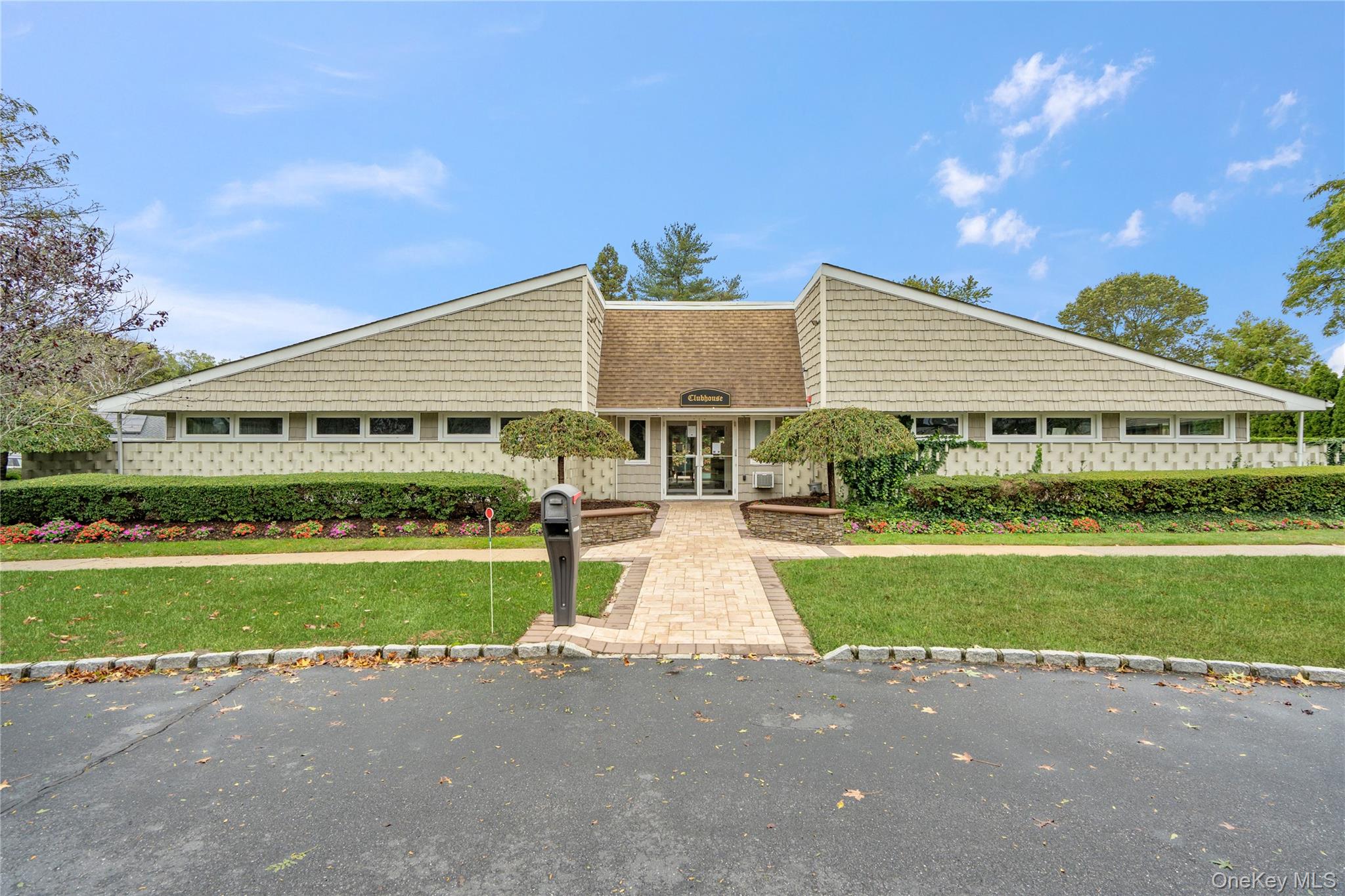 55 Forge Lane Coram, NY 11784 - Photo 20 of 28 a view of house with outdoor space and street view