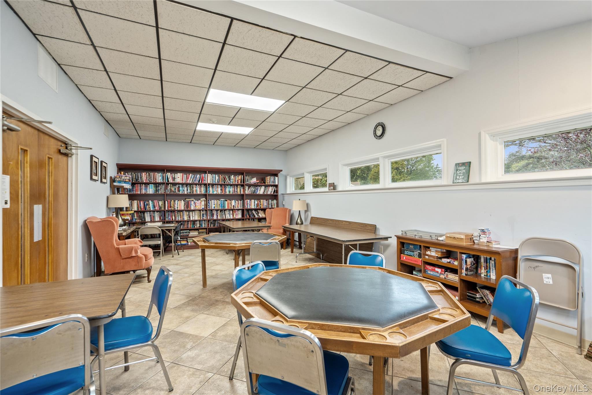 55 Forge Lane Coram, NY 11784 - Photo 24 of 28 a dinning table and chairs in a room