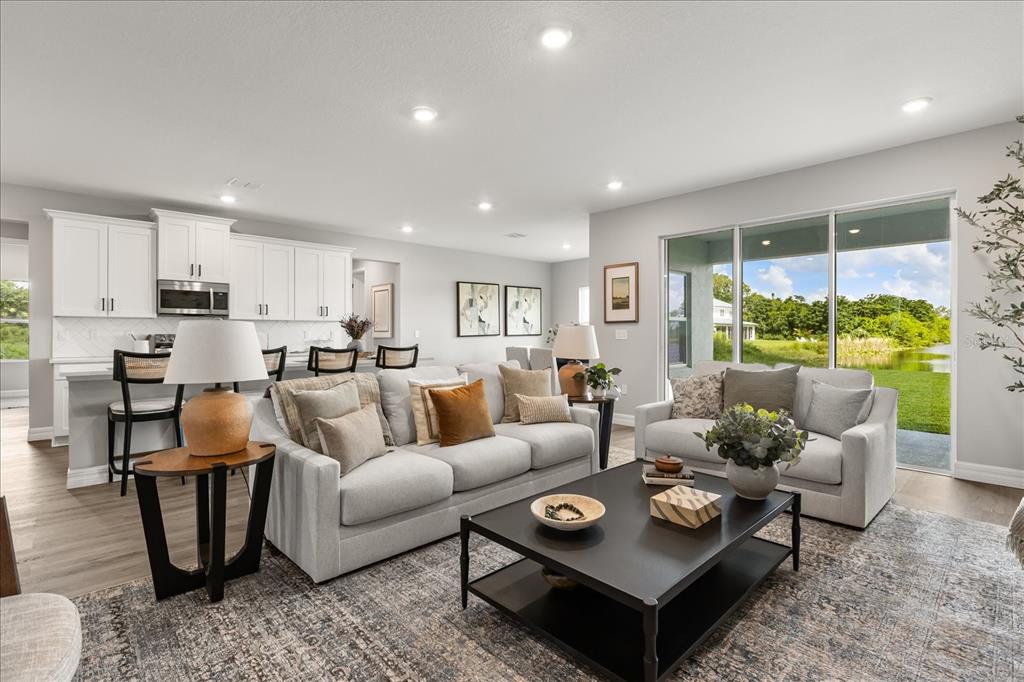 14 Statice Court Homosassa, FL 34446 - Photo 6 of 30 a living room with furniture and a large window