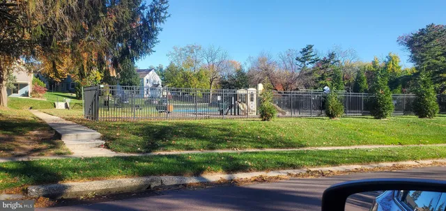 a view of backyard with green space
