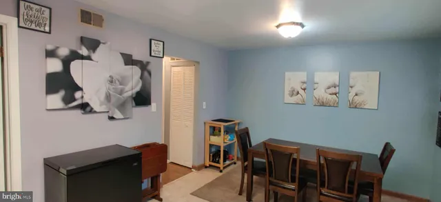 a view of a workspace with furniture