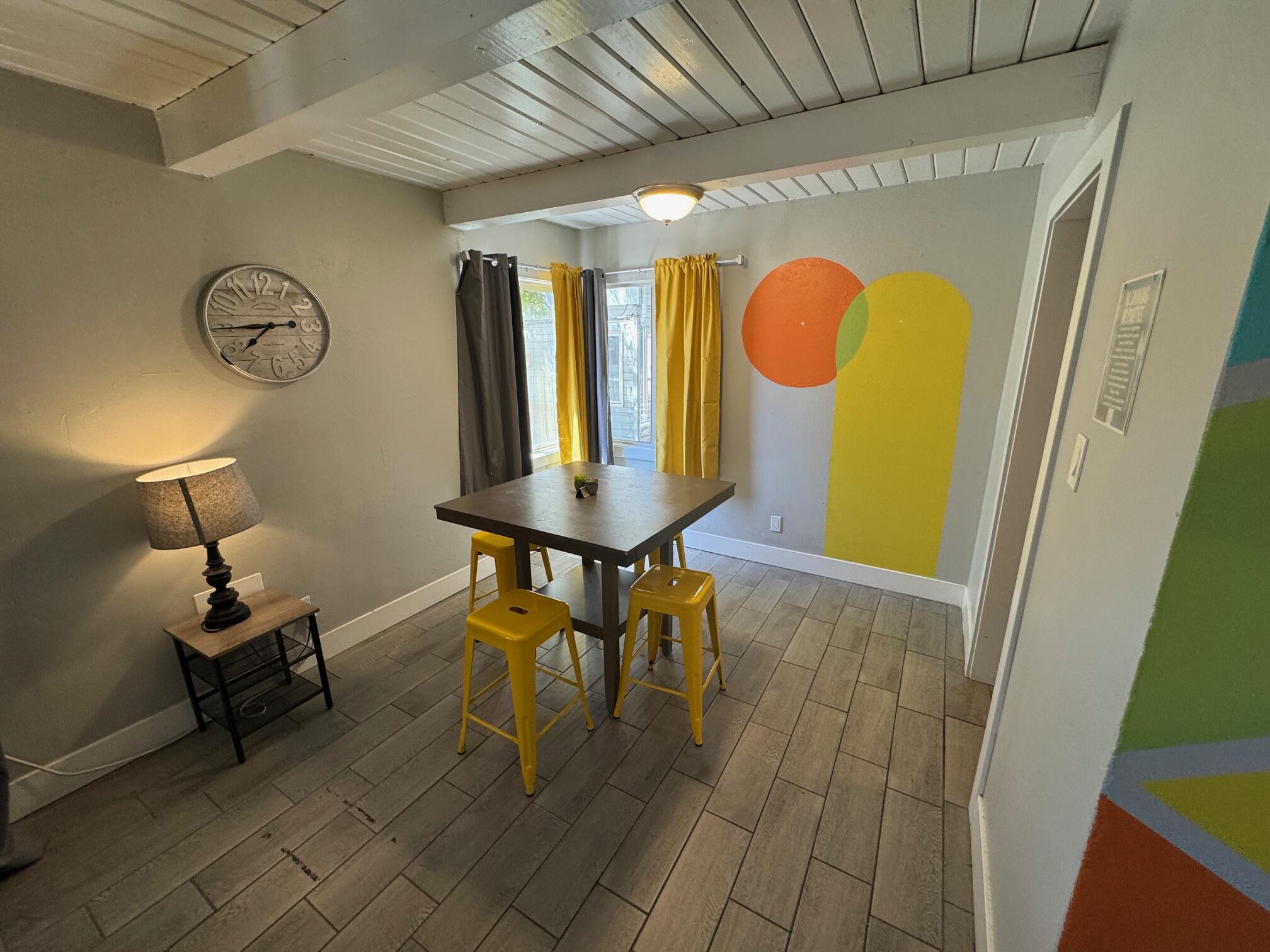 565 Denslowe Drive Reno, NV 89512 - Photo 12 of 26 a view of a room with a table and a chair