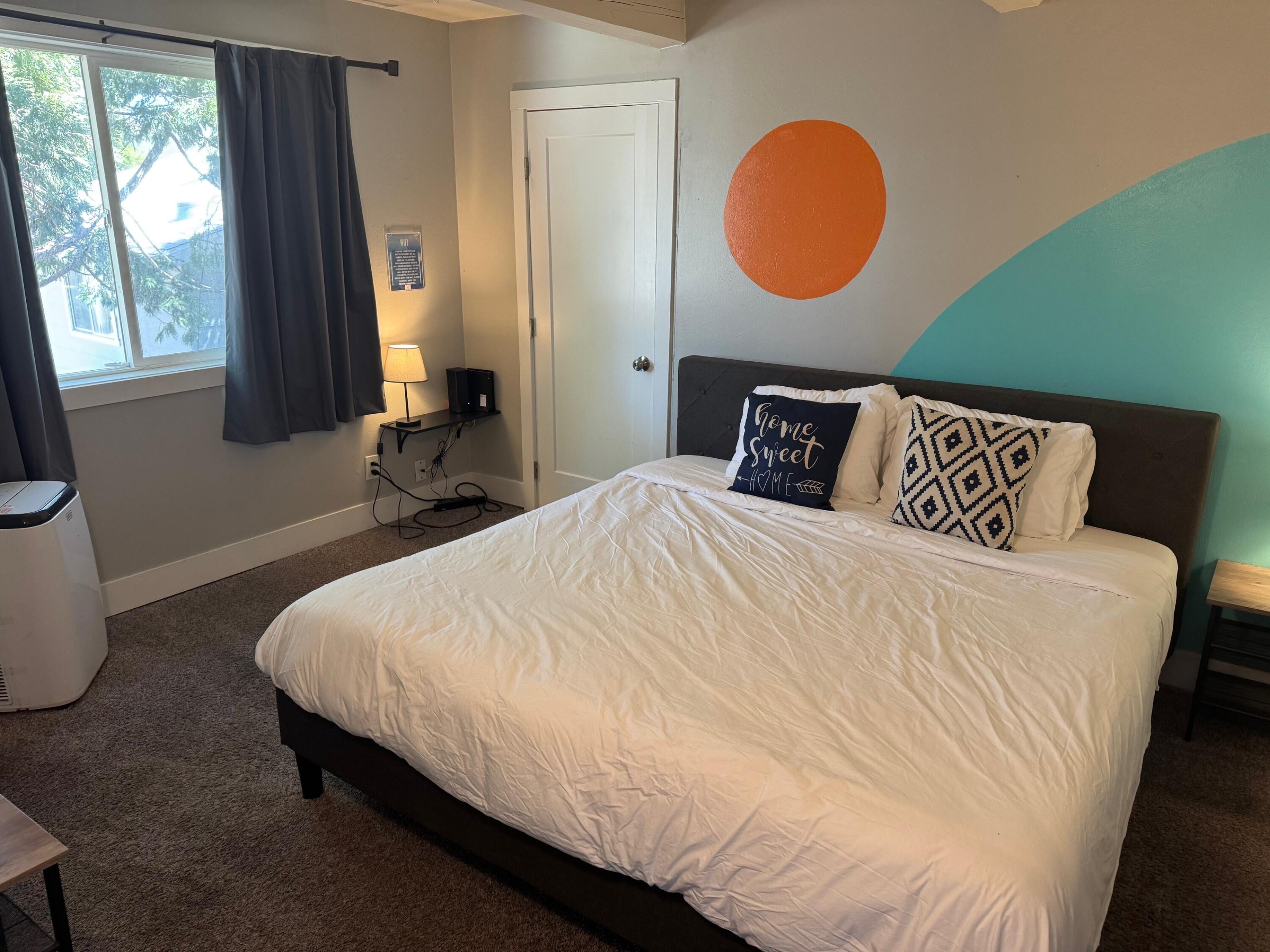 565 Denslowe Drive Reno, NV 89512 - Photo 15 of 26 a bedroom with a bed and window