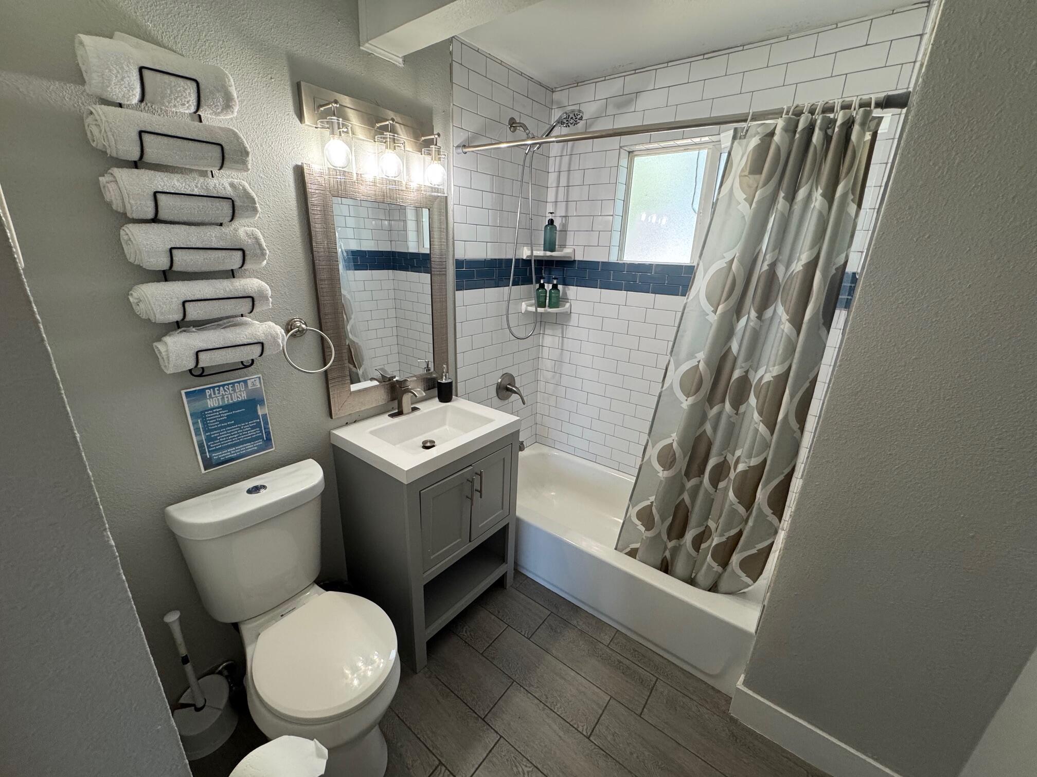 565 Denslowe Drive Reno, NV 89512 - Photo 16 of 26 a bathroom with a sink toilet and shower