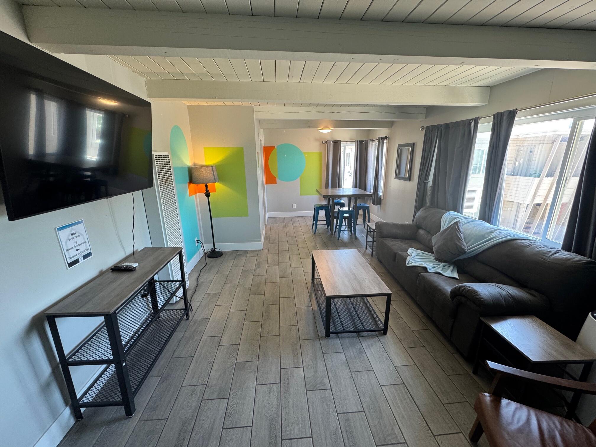 565 Denslowe Drive Reno, NV 89512 - Photo 18 of 26 a living room with furniture and a flat screen tv