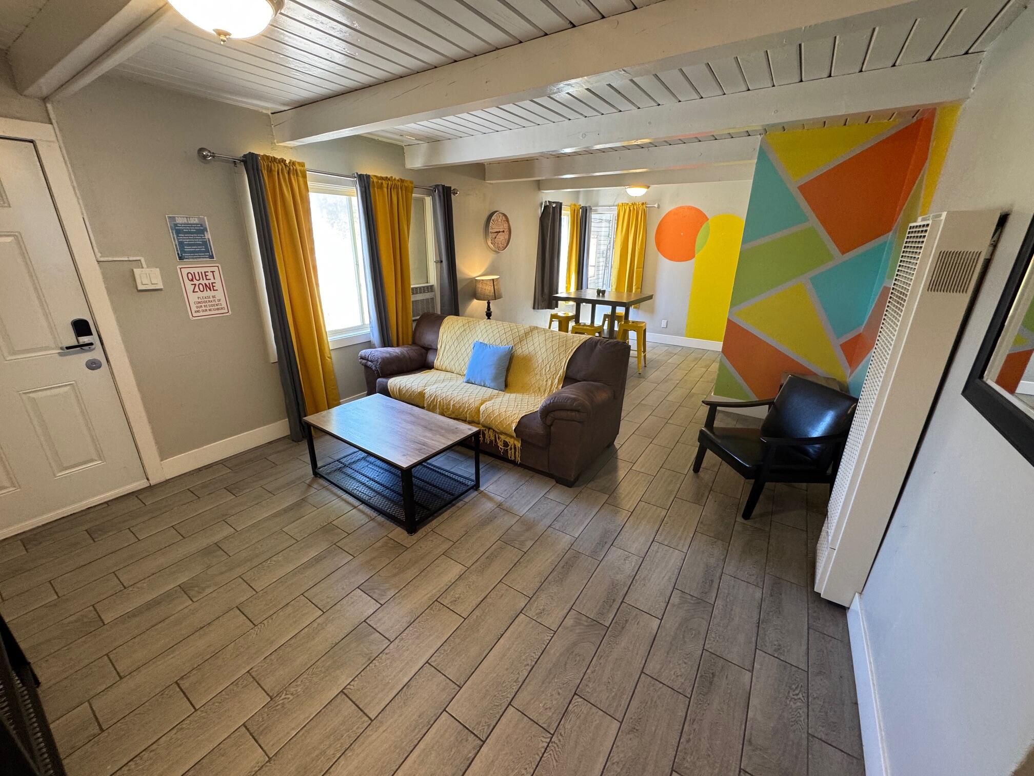 565 Denslowe Drive Reno, NV 89512 - Photo 7 of 26 a living room with furniture and wooden floor
