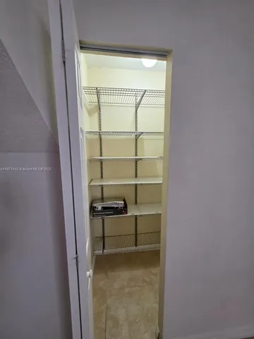 a view of storage and utility room