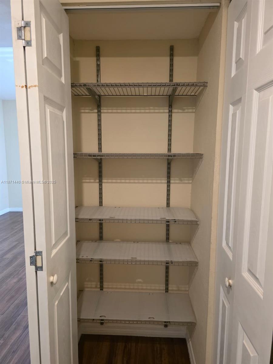 20200 West Country Club Drive, Unit 104 Aventura, FL 33180 - Photo 24 of 43 a view of closet