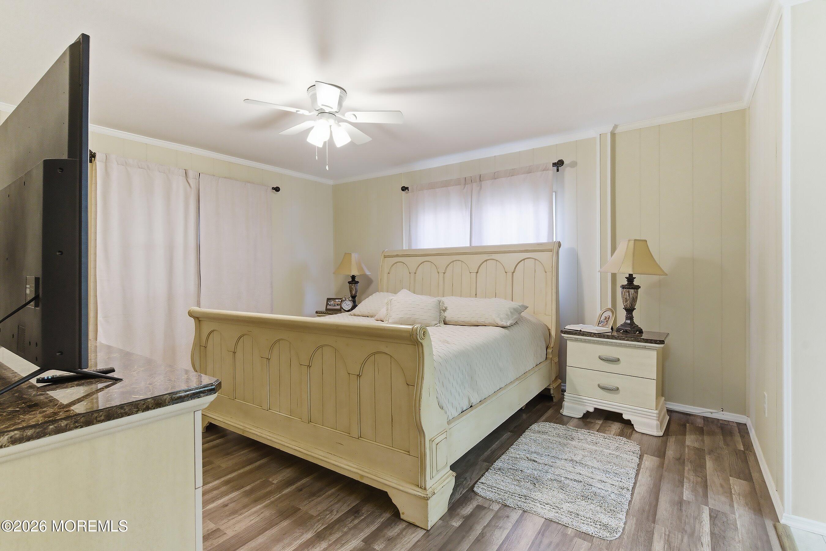 164 Camino Rio Toms River, NJ 08755 - Photo 16 of 36 a bed room with a bed and a flat tv screen