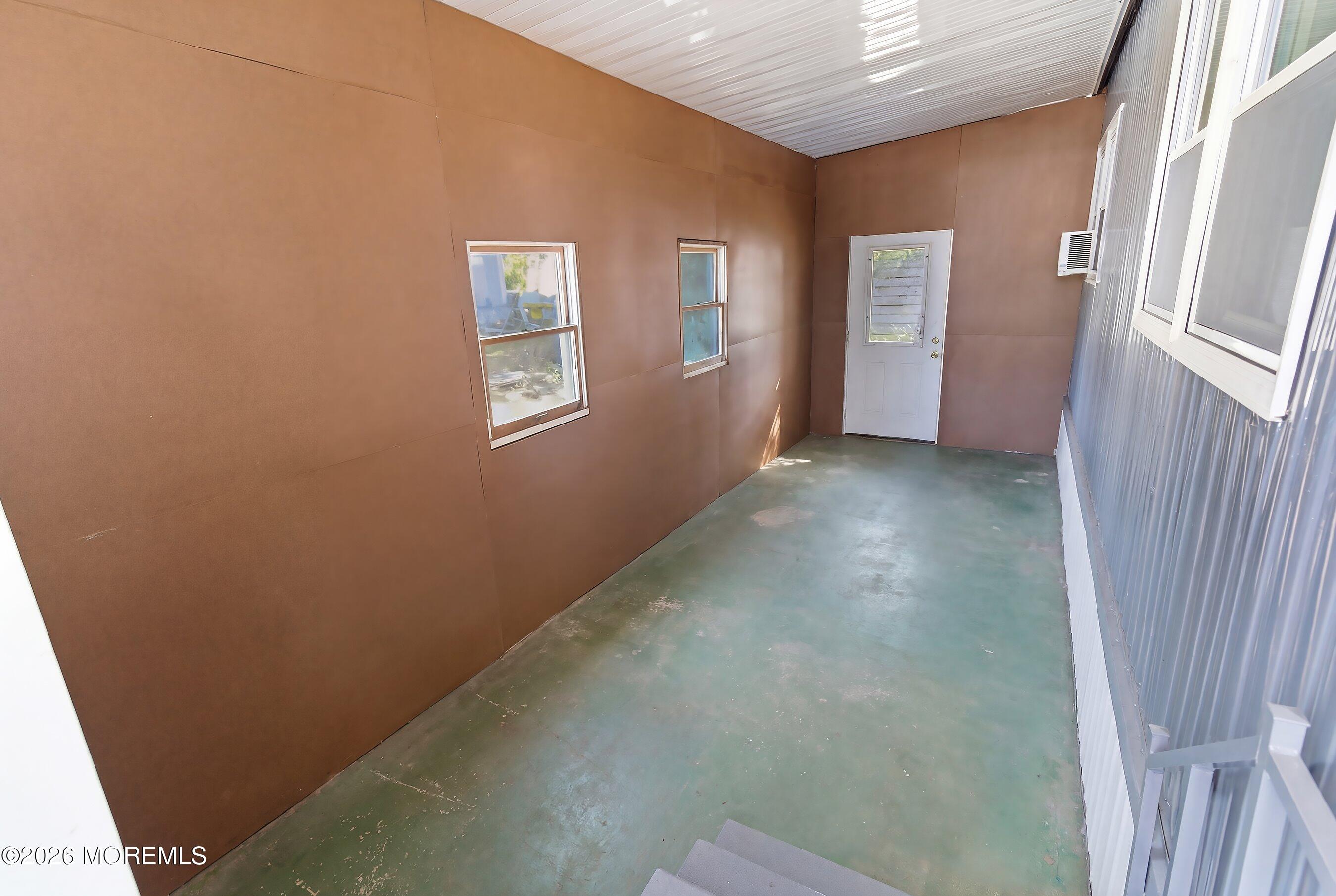 164 Camino Rio Toms River, NJ 08755 - Photo 24 of 36 a view of an empty room with a window