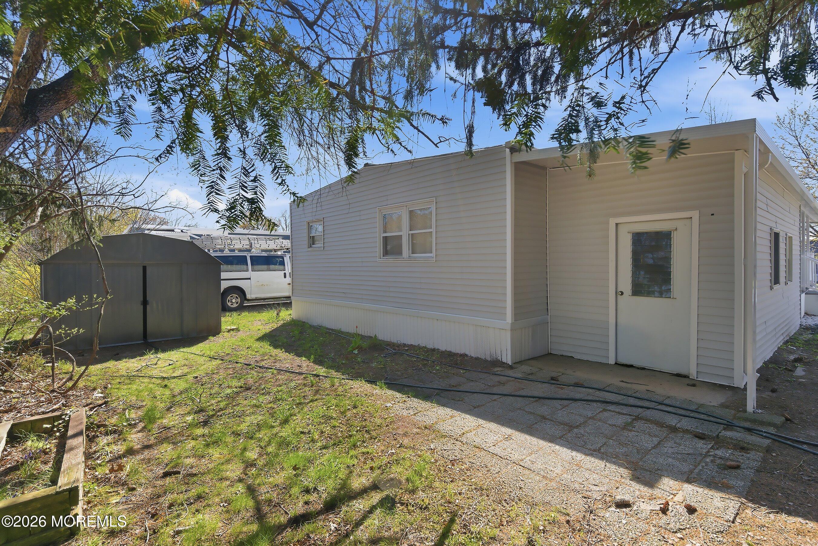 164 Camino Rio Toms River, NJ 08755 - Photo 27 of 36 a backyard of a house