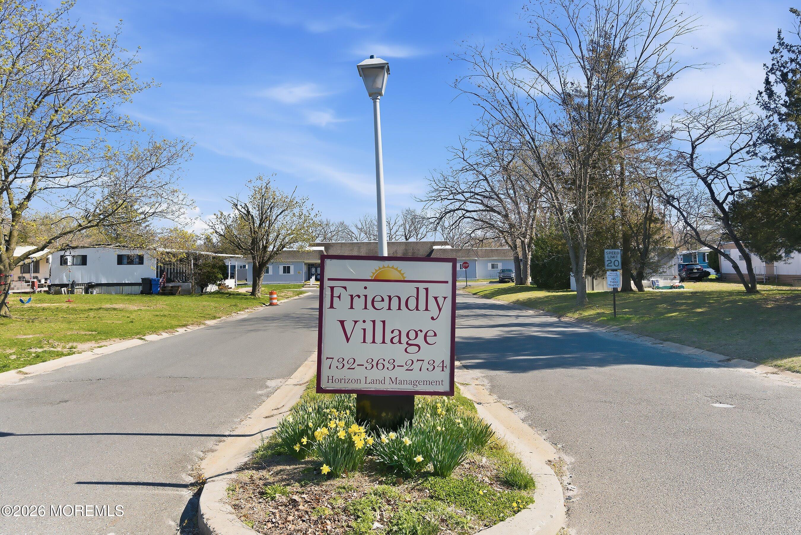 164 Camino Rio Toms River, NJ 08755 - Photo 29 of 36 a sign on the side of a building
