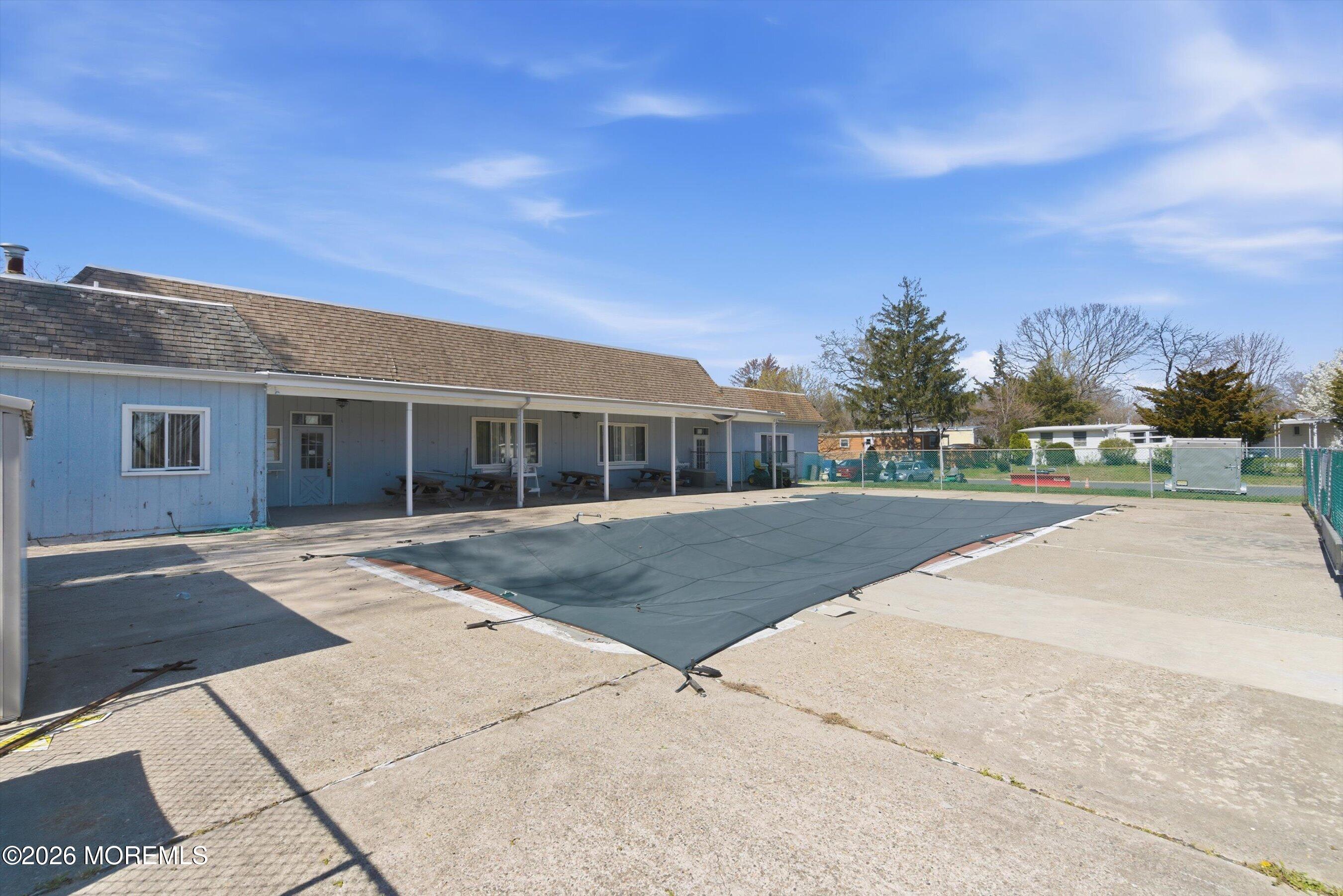 164 Camino Rio Toms River, NJ 08755 - Photo 30 of 36 a view of a house with a yard