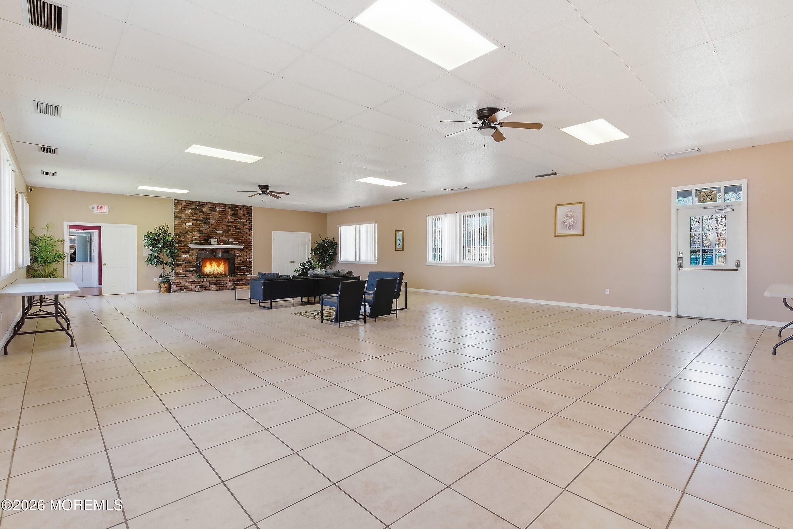 164 Camino Rio Toms River, NJ 08755 - Photo 31 of 36 a view of a livingroom with furniture and a flat screen tv