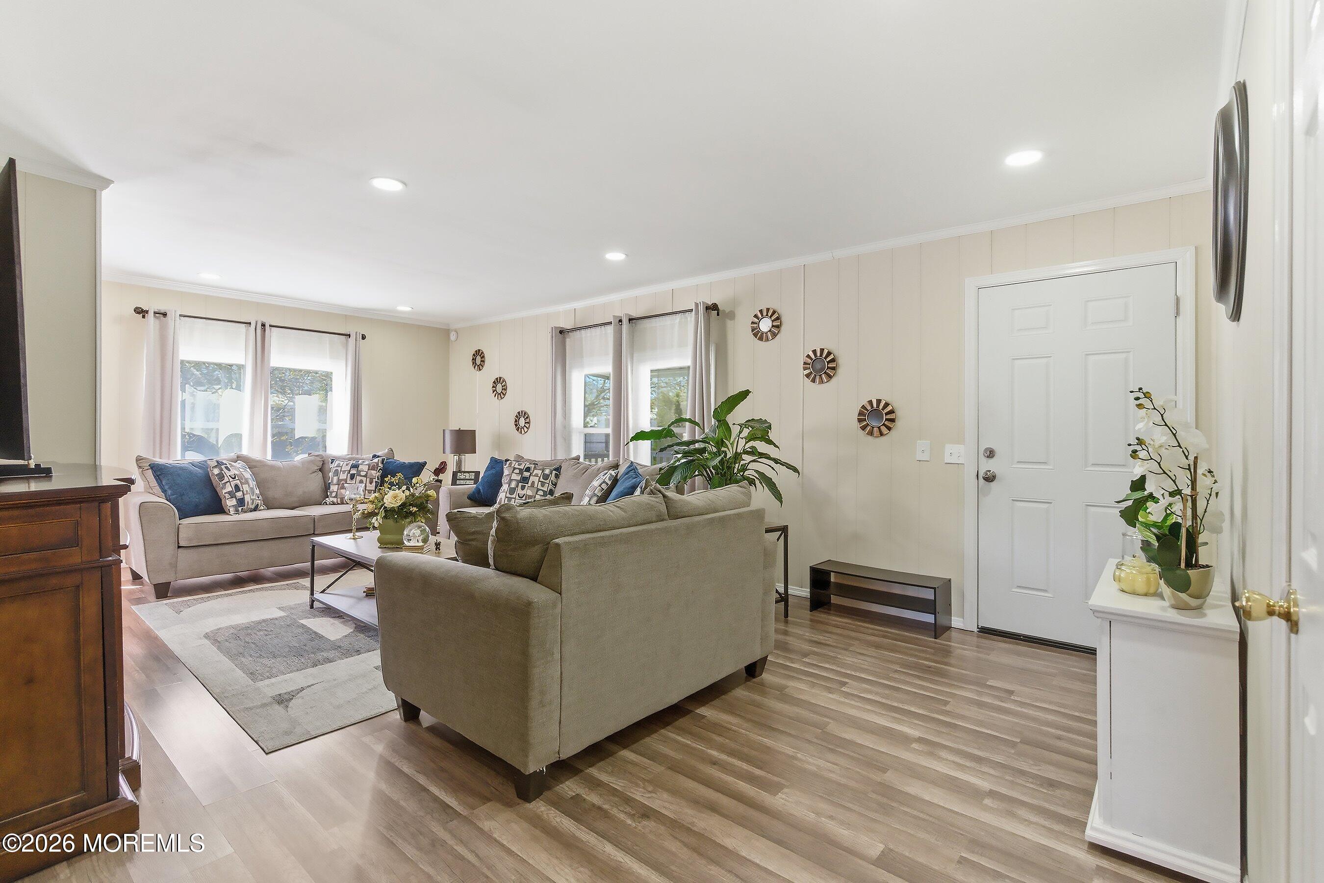 164 Camino Rio Toms River, NJ 08755 - Photo 5 of 36 a living room with furniture and wooden floor