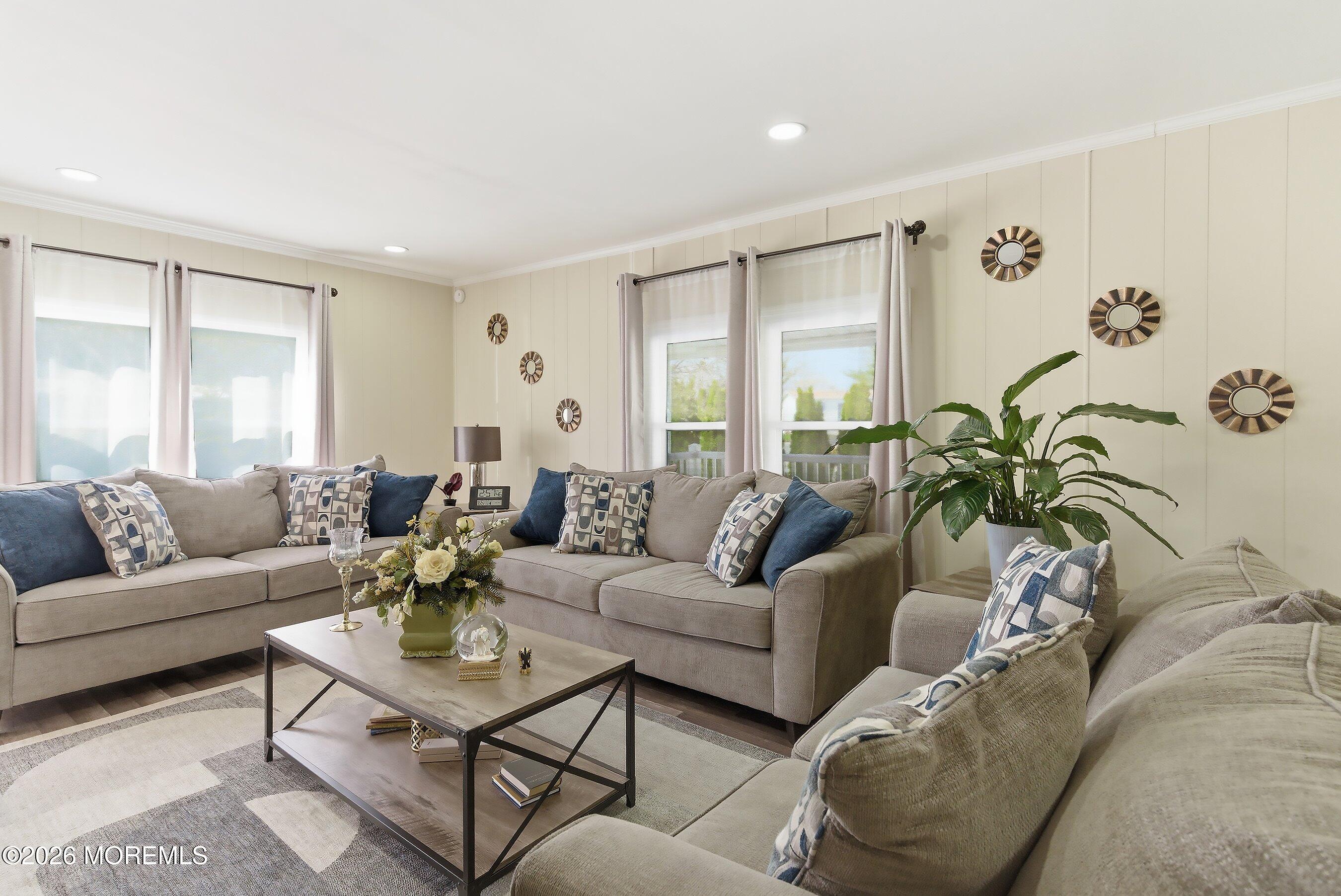 164 Camino Rio Toms River, NJ 08755 - Photo 7 of 36 a living room with furniture potted plant and a large window