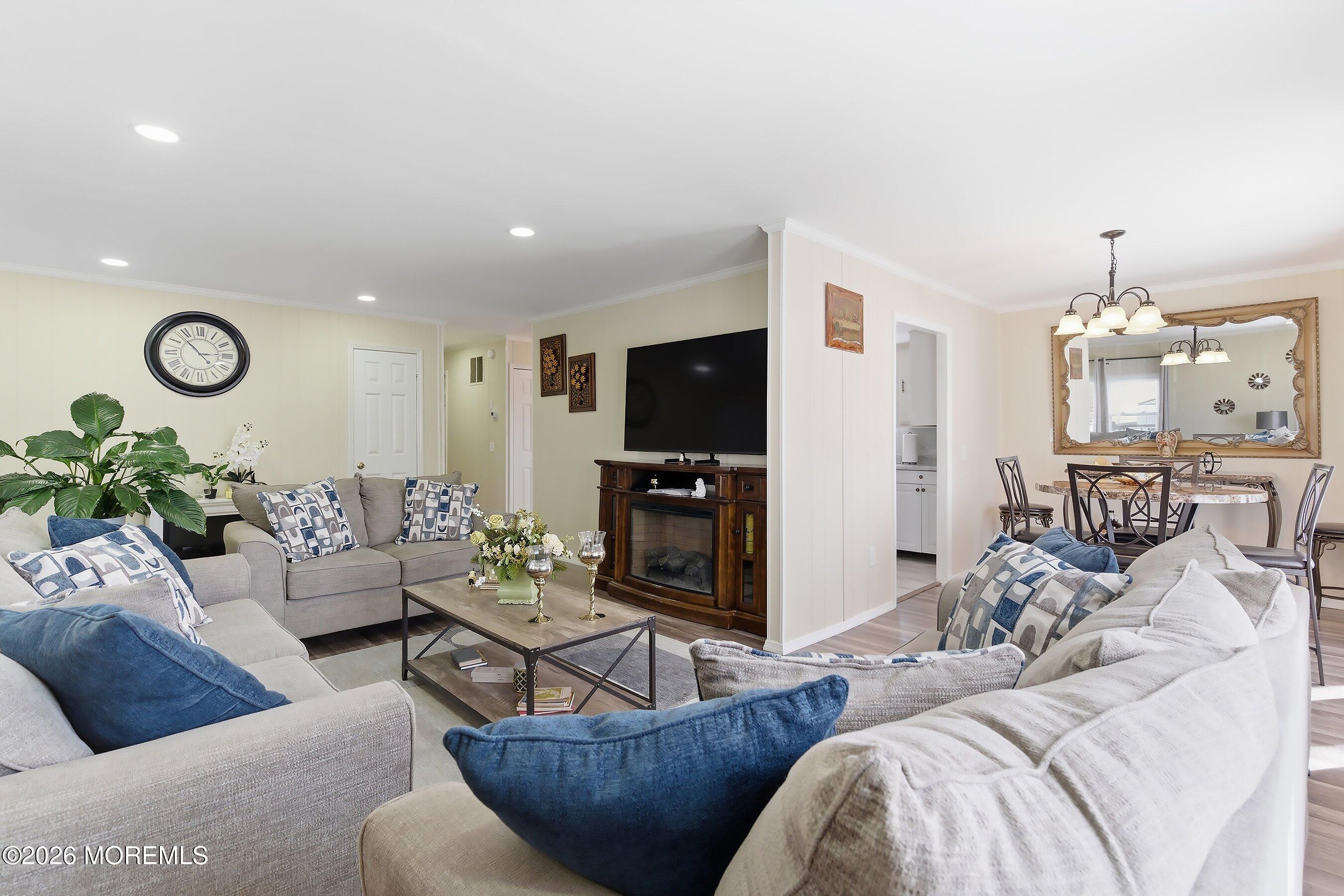 164 Camino Rio Toms River, NJ 08755 - Photo 9 of 36 a living room with furniture and a flat screen tv