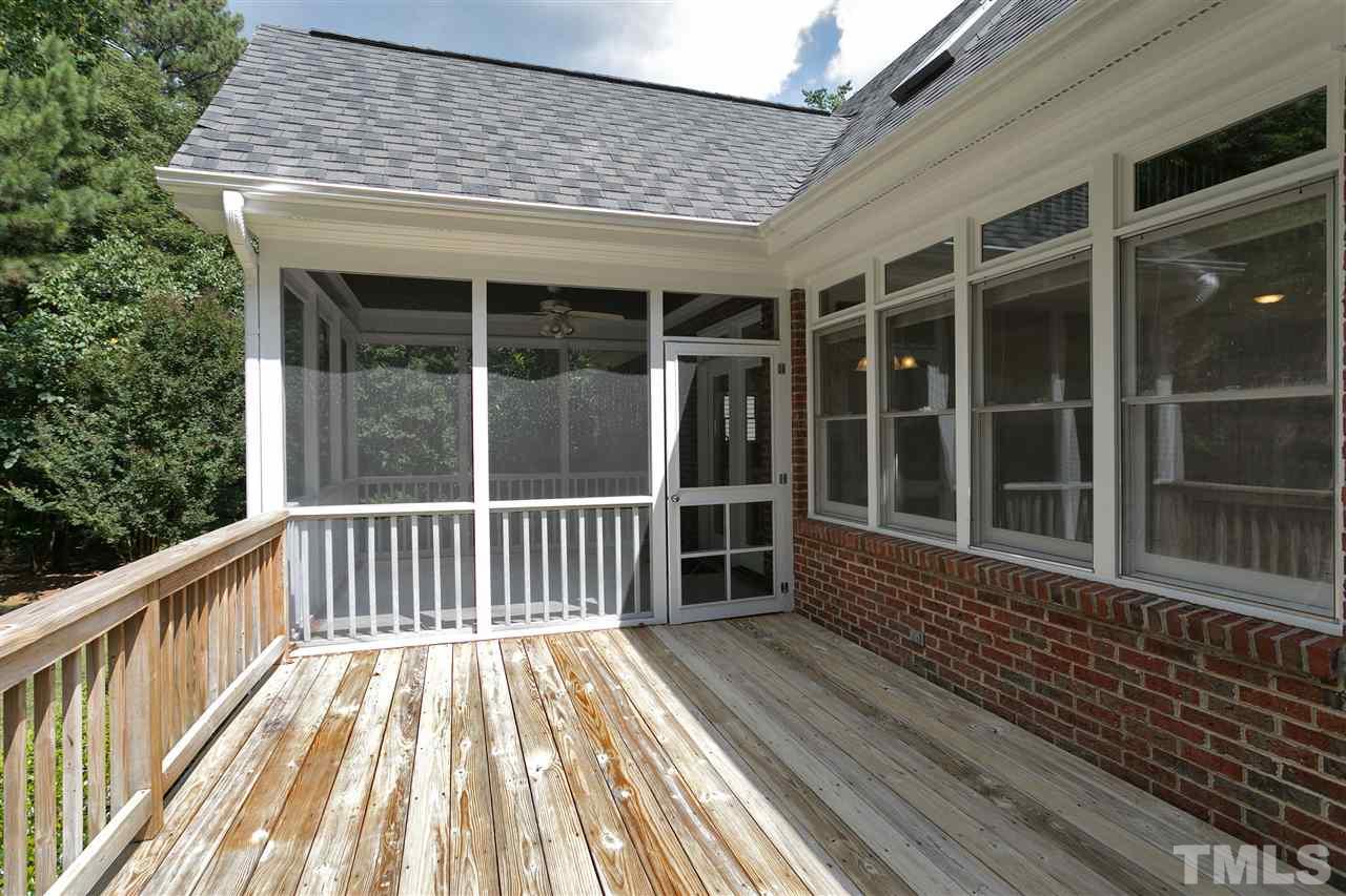3021 Dunkirk Drive Raleigh, NC 27613 - Photo 22 of 25 a view of a wooden deck