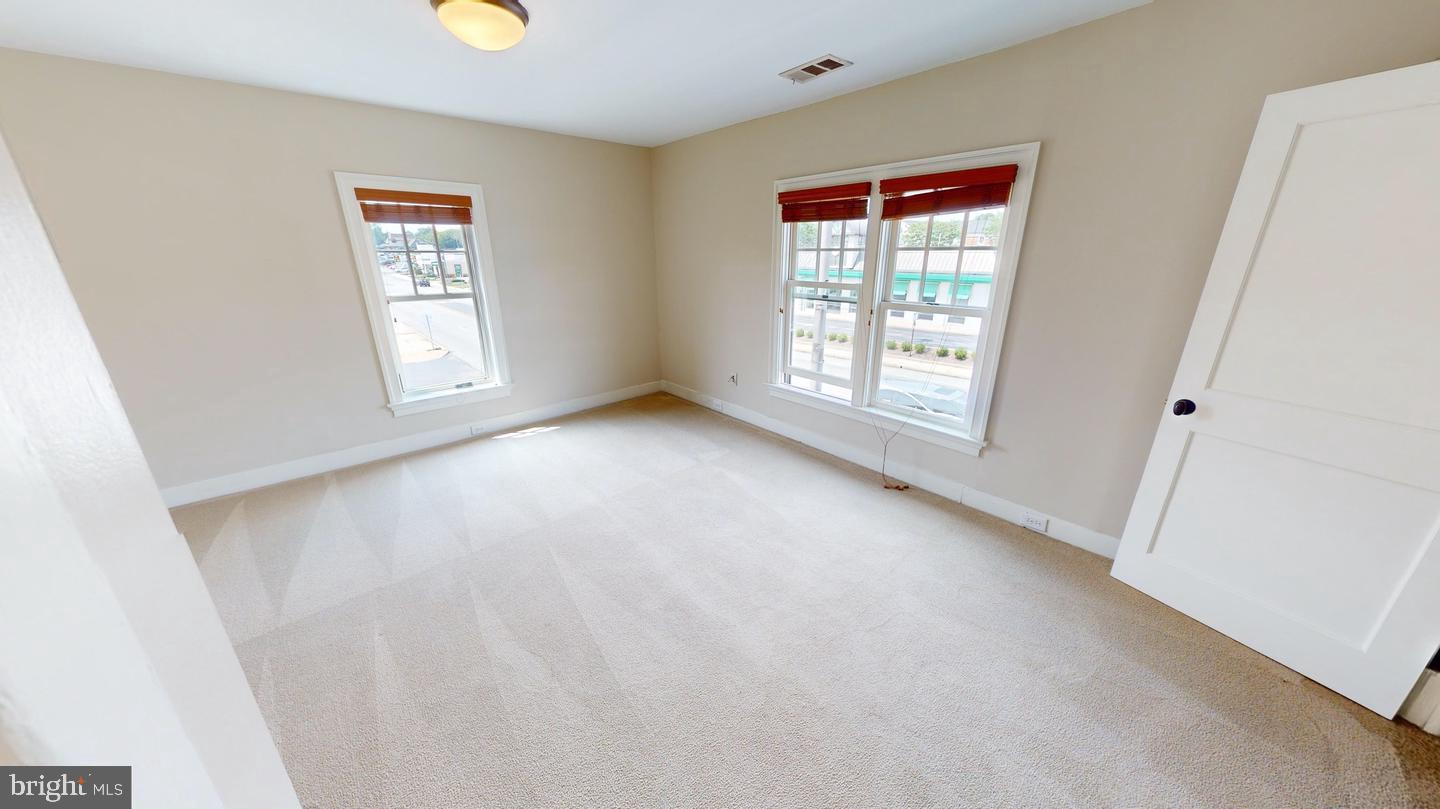 6 South Valley Road, Unit D Paoli, PA 19301 - Photo 5 of 7 a view of an empty room with a window