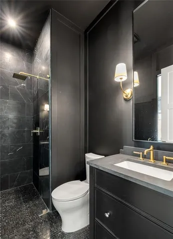 a view of staircase with white walls and a window