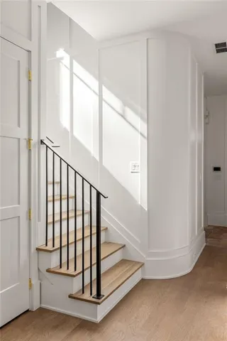 a view of a hallway with a window