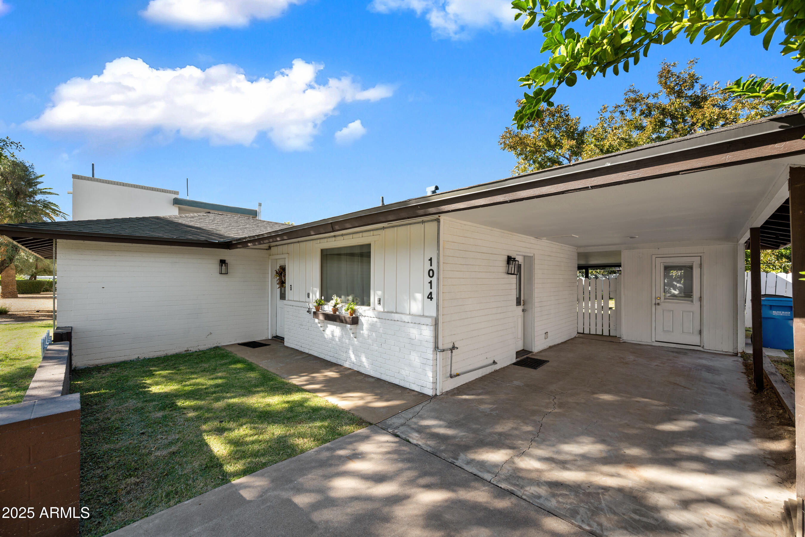 1014 East Orange Drive Phoenix, AZ 85014 - Photo 2 of 20 a view of a house with a garage