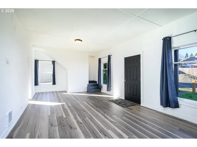 a view interior of a house an empty space and wooden floor