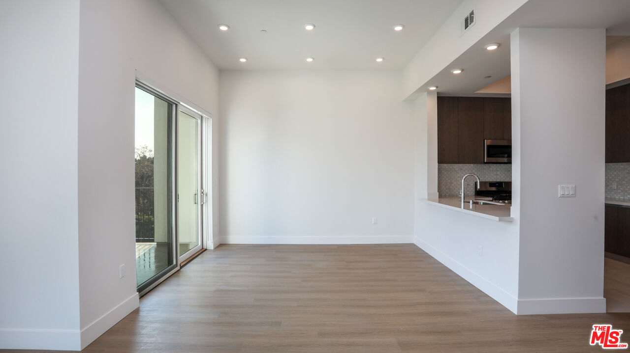 909 Le Doux Road, Unit 403 Los Angeles, CA 90035 - Photo 1 of 28 a view of hallway with stairs