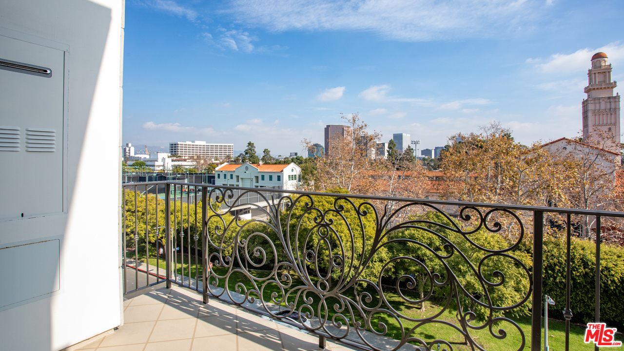 909 Le Doux Road, Unit 403 Los Angeles, CA 90035 - Photo 13 of 28 a view of a balcony with outdoor space