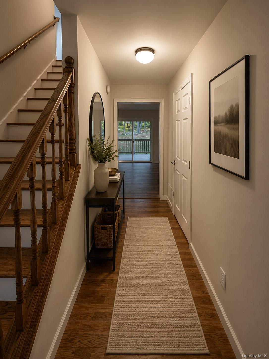 32 Spruce Road Brewster, NY 10509 - Photo 13 of 20 a view of a hallway with wooden floor and stairs