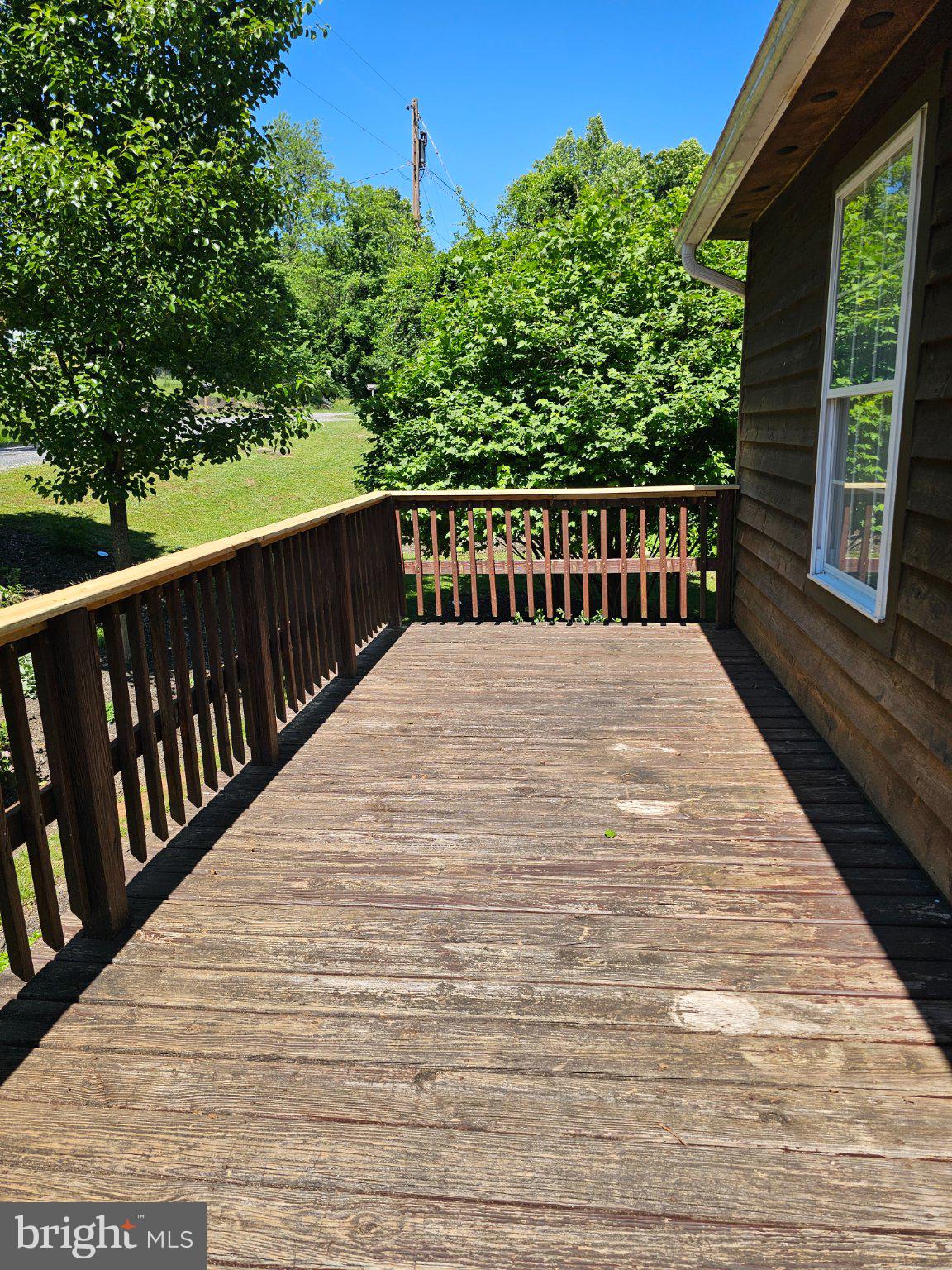 32 Parnassus Road Linden, VA 22642 - Photo 36 of 50 Sunny deck with lush greenery views.
