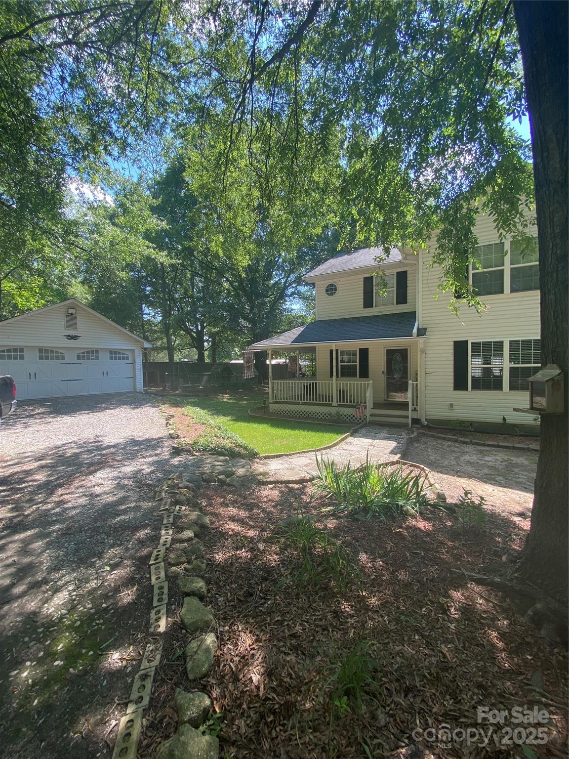1975 Kehl Road Clover, SC 29710 - Photo 24 of 28 a view of a house with a yard