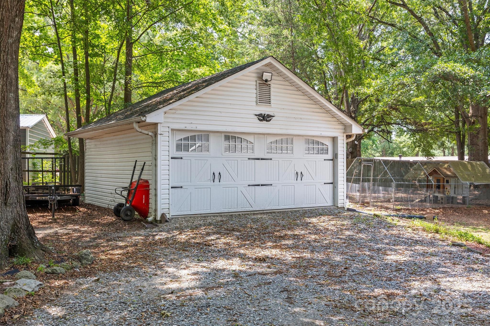 1975 Kehl Road Clover, SC 29710 - Photo 5 of 28 a view of a small house with wooden fence