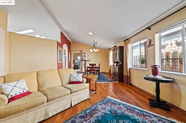 a living room with furniture and a table