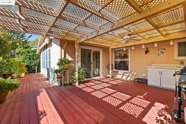 a front view of a house with outdoor seating
